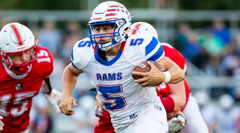 Greeneview High School junior Alex Horney runs the ball during their game against Southeastern on Friday night in South Charleston. The Rams won 20-13. MICHAEL COOPER/CONTRIBUTED PHOTO