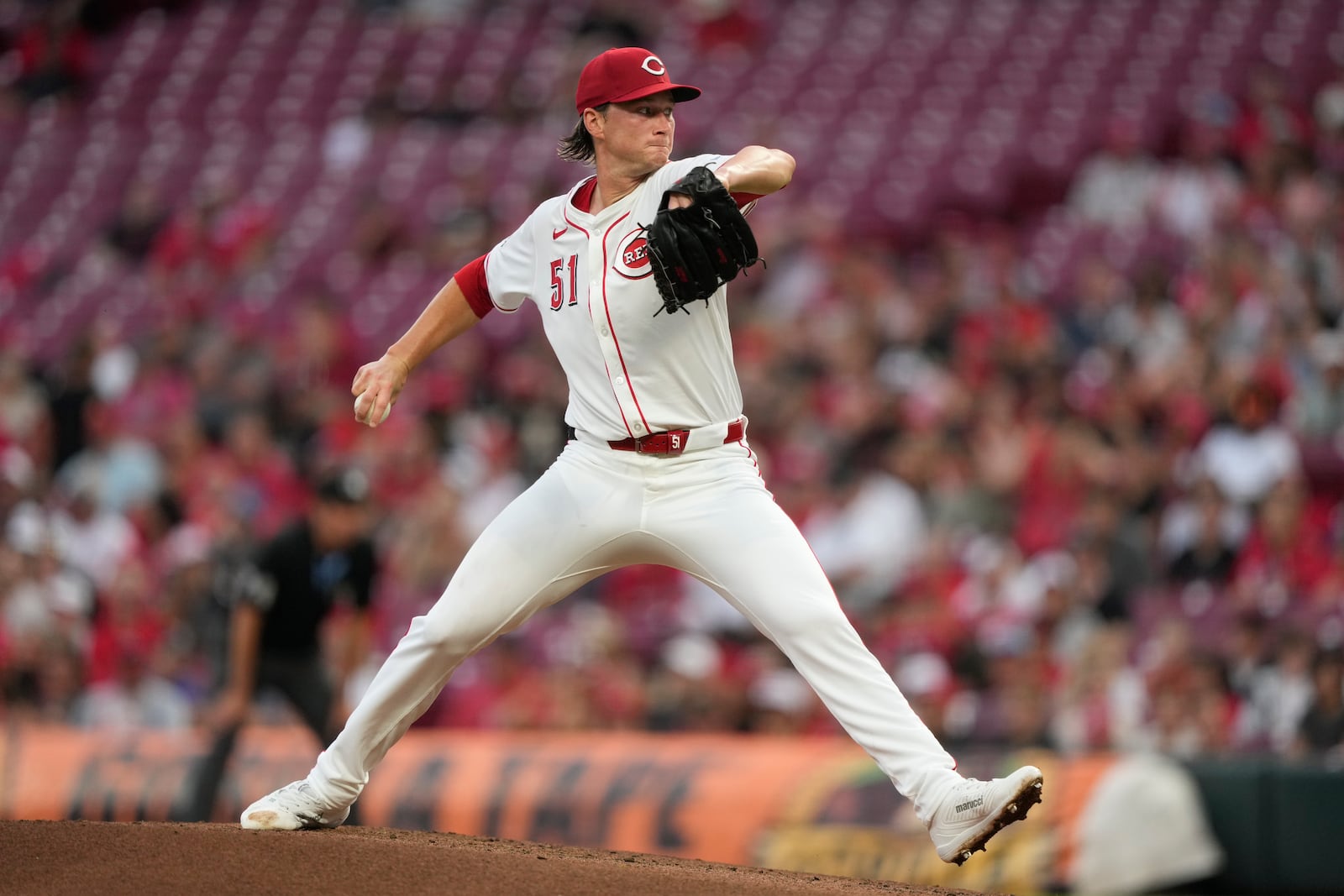 Cincinnati Reds pitcher Brady Singer throws during the second inning of a baseball game against the Miami Marlins in Cincinnati, Monday, July 7, 2025. (AP Photo/Carolyn Kaster)