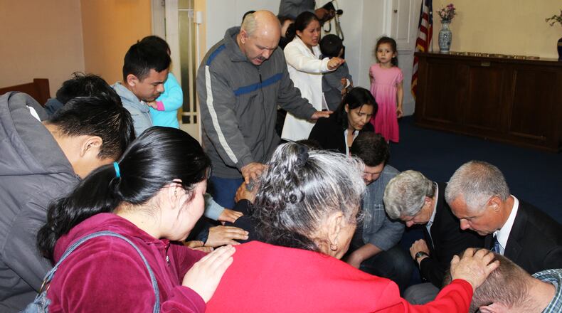 Area pastors and advocates of immigration reform gathered at Emmanuel Iglesia Hispana in Springfield Monday, and prayed for changes they argued would help keep families intact while improving national security. The group said they will travel with hundreds of other pastors to Washington, D.C., to push local congressmen to take action on immigration reform. Jeff Guerini/Staff