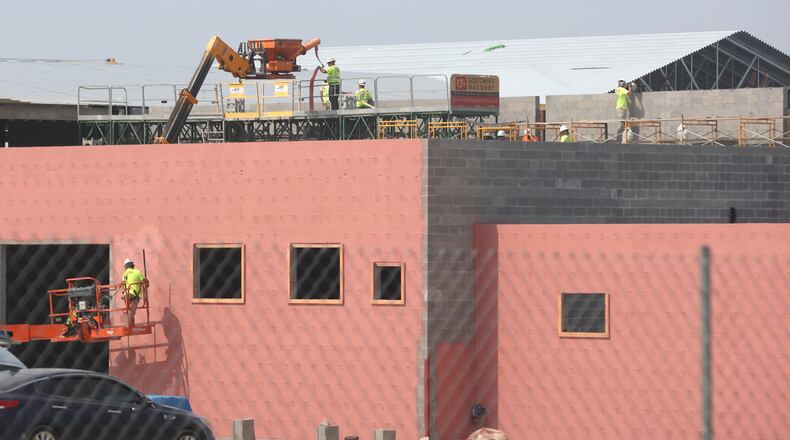 Construction continues on the new Northeastern School in South Vienna Tuesday, May 25, 20021. BILL LACKEY/STAFF