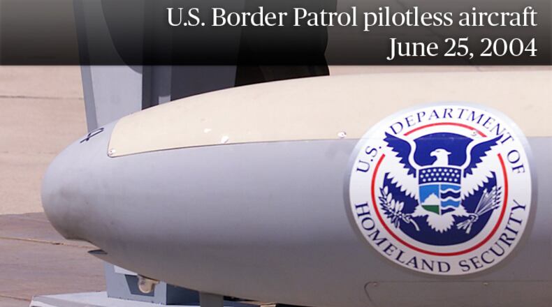 The U.S. Border Patrol's Michael Nicley talks during a press conference about the new unmanned-aerial-vehicle or UAV that takes off today on the first operation flight of the pilotless aircraft at Fort Huachuca, Ariz. on Friday, June 25, 2004. The unmanned drone uses thermal and night-vision equipment to help agents spot illegal immigrants trying to cross the desert into the United States. (AP Photo/John Miller)