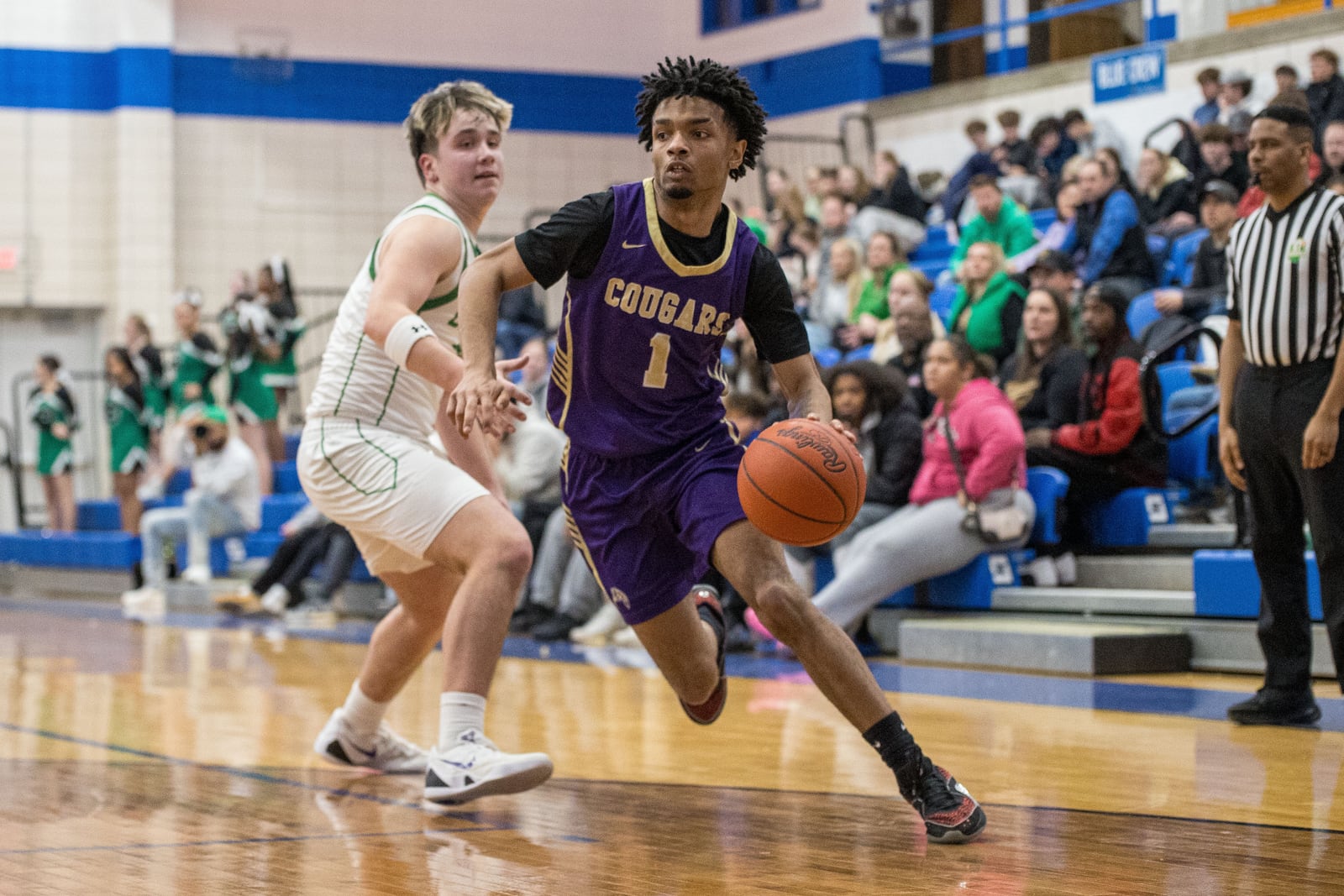 Thurgood Marshall senior Jamarion Nelson drives past a Bethel defender during their game on Monday, Feb. 23, 2026 at Xenia High School. The Cougars won 65-56. MICHAEL COOPER / STAFF PHOTO