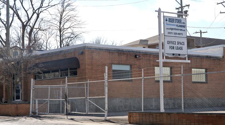 The former Roger Storer & Son Plumbing location on South Center Street was recently purchased by the Clark County Library. BILL LACKEY/STAFF
