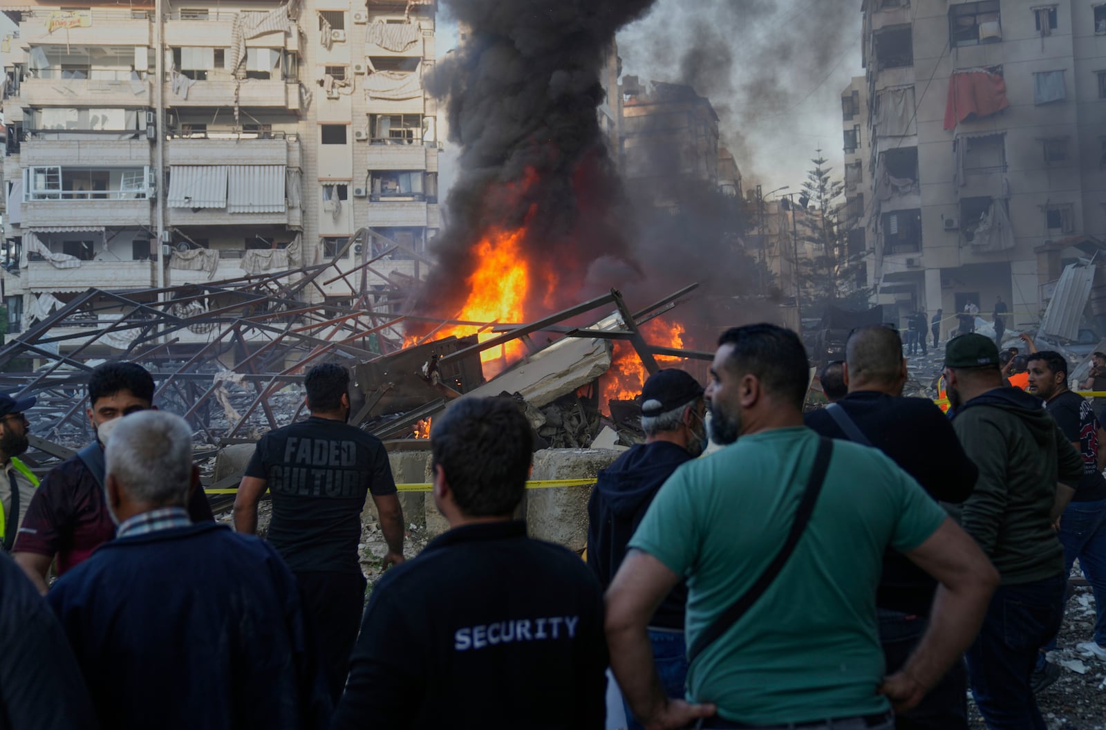 Flames rise after an Israeli airstrike in Dahiyeh, southern suburb of Beirut, Lebanon, Sunday, April 27, 2025. (AP Photo/Hussein Malla)