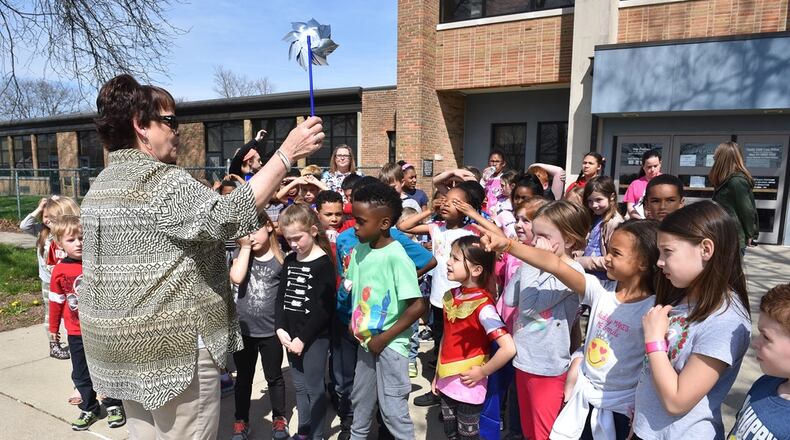 Beverley Knight-Stukenborg, 88th Medical Group family advocacy outreach manager talks to the children at the Prairies Child Development Center school age program at Wright-Patterson Air Force Base, April 26, 2018. U.S. Air Force photo by Al Bright