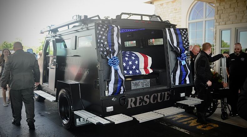 The casket of Clark County Sheriff’s Deputy Matthew Yates is loaded into the SWAT vehicle that will transport his remains to the cemetery in this August 1, 2022, file photo. MARSHALL GORBY/STAFF