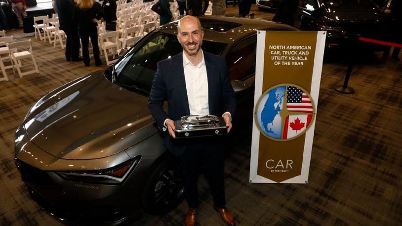 Acura National Sales Assistant Vice President Emile Korkor with the 2023 North American Car of the Year award-winning 2023 Acura Integra, in Detroit on January 11.