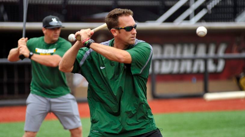 Wright State baseball coach Greg Lovelady hits infield during practice Thursday at the University of Louisville’s Jim Patterson Stadium, where the Raiders will face Ohio State in the NCAA Regionals today at 2 p.m. Staff photo