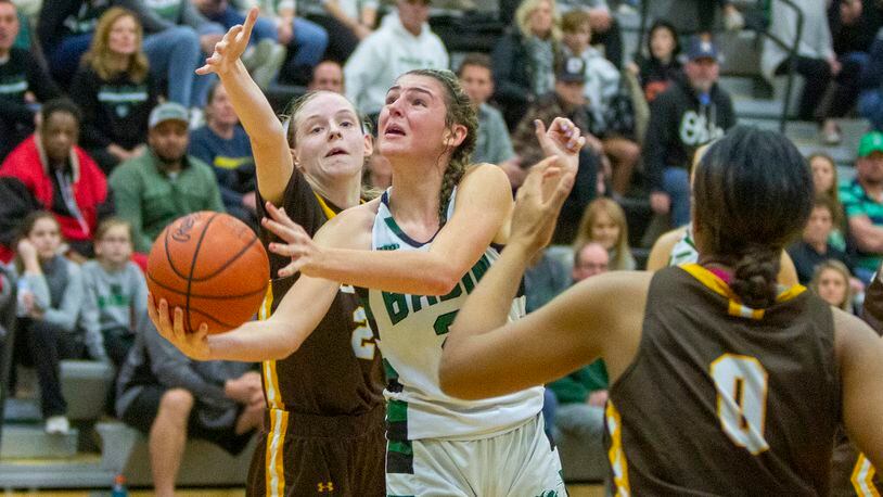 Badin's Braelyn Even slips past Alter's Elena Thompson (2) for a shot during a game earlier this season. CONTRIBUTED/Jeff Gilbert