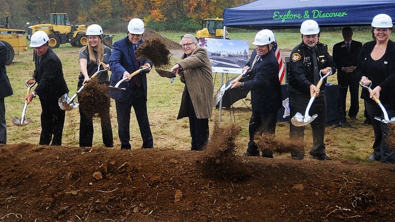 Ohio Governor Mike DeWine, center, along with Greene County leaders broke ground Friday, Oct. 27, 2023 for the new Greene County Gene Fischer Correctional Center. MARSHALL GORBY\STAFF
