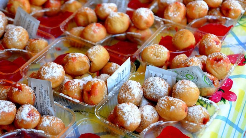 A smaller scale Strawberry Jam downtown on July 4 and July 5, 2021, will feature music and food only after the Troy Strawberry Festival was canceled for the second time due to the coronavirus pandemic. Pictured ae strawberry sweets from last festival, the 2019 Troy Strawberry Festival that took place June 1-2, 2019, in downtown Troy around the Public Square and along the Great Miami River levee. Festival-goers enjoyed strawberry treats, festival eats and shopped and hundreds of booths. DAVID MOODIE/CONTRIBUTED