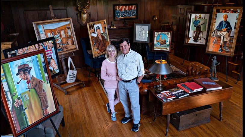 Paintings in Gary Blevins Norman Rockwell series surround the artist and girlfriend Patty Mumma in Rockwell’s restored studio in Arlington, Vt. CONTRIBUTED