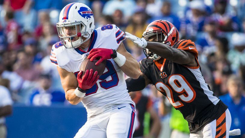 ORCHARD PARK, NY - AUGUST 26: Brandon Reilly #89 of the Buffalo Bills makes a first down reception as Tony McRae #29 of the Cincinnati Bengals defends during the fourth quarter of a preseason game at New Era Field on August 26, 2018 in Orchard Park, New York. Cincinnati defeats Buffalo 26-13 in the preseason matchup. (Photo by Brett Carlsen/Getty Images)