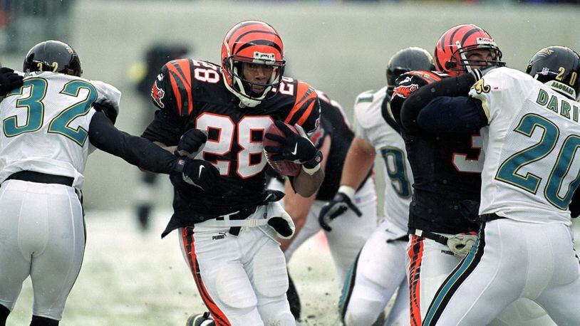 17 Dec 2000: Corey Dillon #28 of the Cincinnati Bengals moves with the ball during the game against the Jacksonville Jaguars at the Paul Brown Stadium in Cincinnati, Ohio. The Bengals defeated the Jaguars 17-14.Mandatory Credit: Jonathan Daniel /Allsport