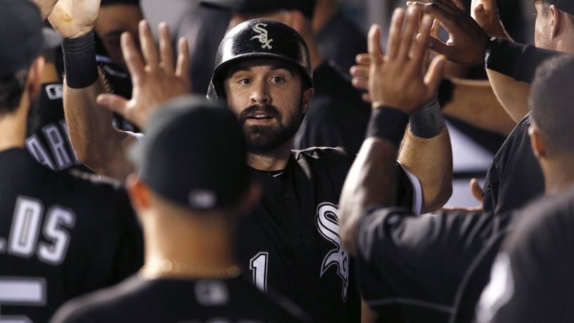 The White Sox’s Adam Eaton celebrates with teammates after scoring on a sacrifice fly by Melky Cabrera during the first inning against the Kansas City Royals in September. (AP Photo/Nam Y. Huh, File)
