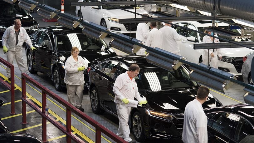 Employees look over 2018 Honda Accords in Marysville, Ohio. Ty Wright/Bloomberg