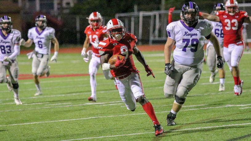 Wittenberg University junior Troy Jones returns an interception during the Tigers’ 45-3 victory over Kenyon at Edwards-Maurer Field in Springfield in 2018. Michael Cooper/Contributed