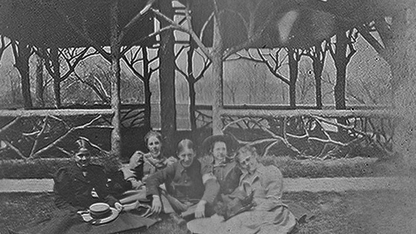 This photo from around 1918 shows a young unidentified Springfield soldier home on leave, enjoying a visit to Snyder Park. He and the four ladies around him are posing in front of the old rustic shelter, one of the earliest structures in the park. PHOTO COURTESY OF THE CLARK COUNTY HISTORICAL SOCIETY