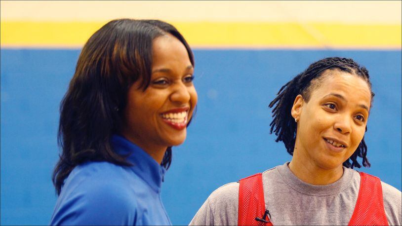 Former professional and local basketball stars Tamika Williams, left, and Rhonda Price will be playing in a Cancer Awareness Basketball Game in Dayton.  TY GREENLEES / STAFF