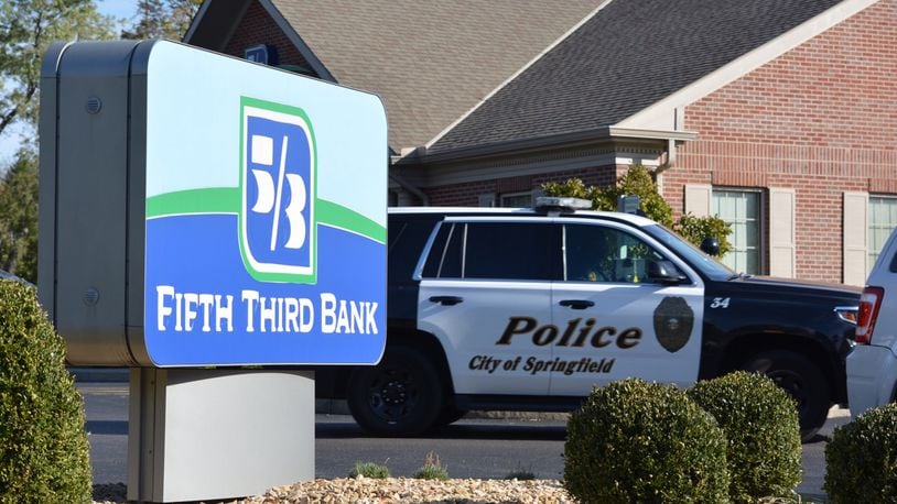 A suspect who robbed a a Fifth Third Bank location in Springfield Monday had his face covered with two scarfs, a police report says.