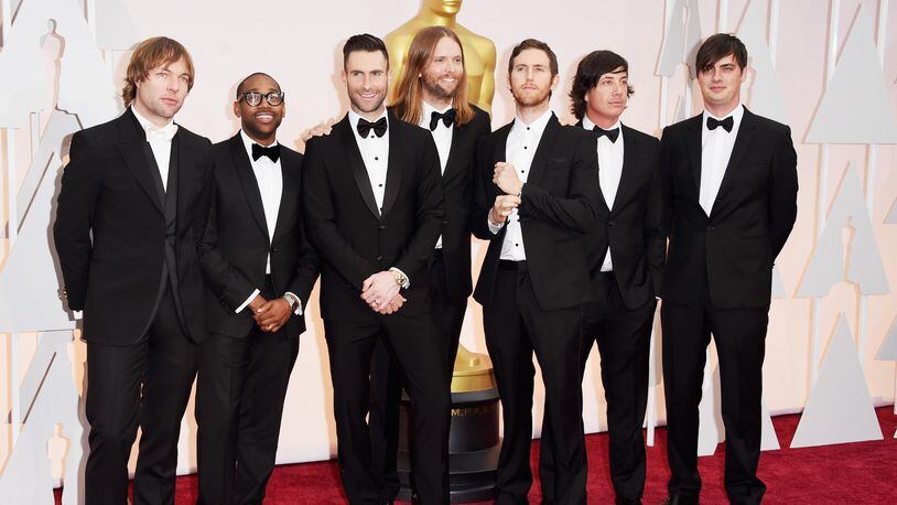 HOLLYWOOD, CA - FEBRUARY 22:  Michael Madden, PJ Morton, Adam Levine, James Valentine, Jesse Carmichael, and Matt Flynn of Maroon 5  attends the 87th Annual Academy Awards at Hollywood & Highland Center on February 22, 2015 in Hollywood, California.  (Photo by Jason Merritt/Getty Images)