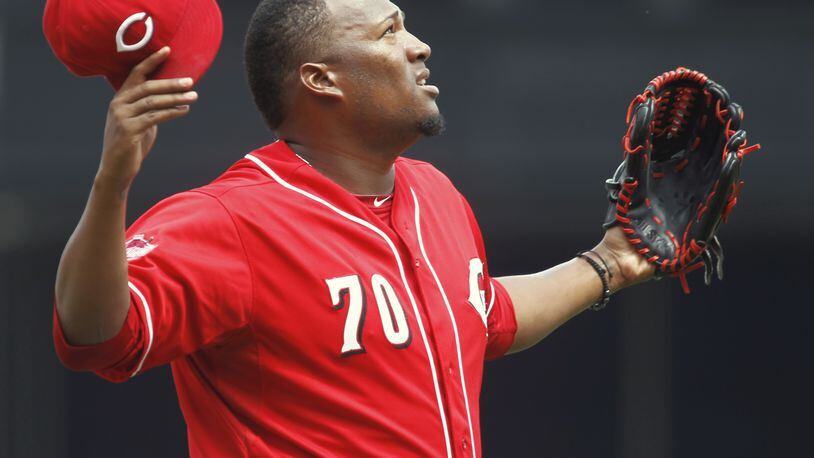 Reds reliever Jumbo Diaz reacts after getting an out against the Indians on Sunday, July 19, 2015, at Great American Ball Park in Cincinnati. David Jablonski/Staff