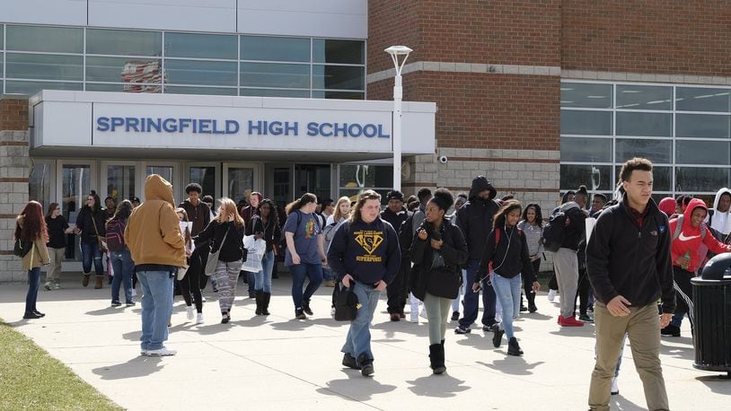 Students leave Springfield High School at the end of the school day. Bill Lackey/Staff