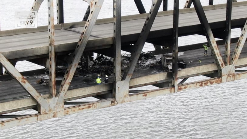 Michael Benedic
Crews survey the damage on the lower deck of the Brent Spence Bridge on Wedensday, Nov. 11, 2020. Two semitrailers crashed on the bridge, and the chemical fire that followed damaged the top deck, officials said. CONTRIBUTED BY MICHAEL BENEDIC / WCPO-TV