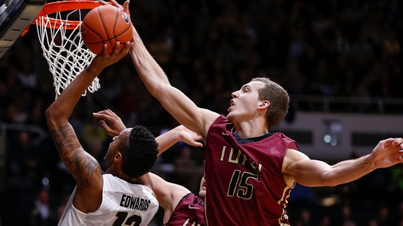 WEST LAFAYETTE, IN - DECEMBER 7: Matt O’Leary #15 of the IUPUI Jaguars blocks the shot of Vince Edwards #12 of the Purdue Boilermakers at Mackey Arena on December 7, 2015 in West Lafayette, Indiana. Purdue defeated IUPUI 80-53. (Photo by Michael Hickey/Getty Images)
