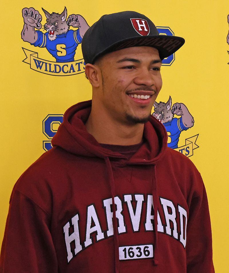 Springfield High School football standout Delian Bradley made his college selection Wednesday during National Signing Day. Delian chose Harvard from the 31 college scholarship offers. BILL LACKEY/STAFF