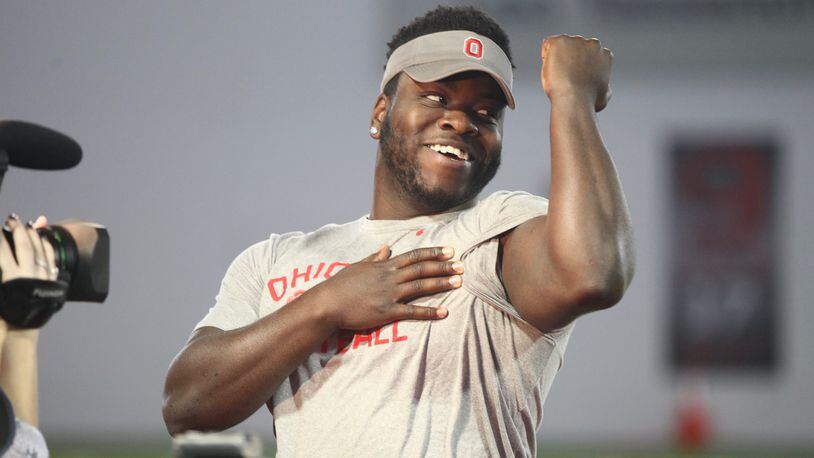 Ohio State’s Robert Landers poses for a TV camera on Thursday, Dec. 15, 2016, at the Woody Hayes Athletic Center in Columbus. David Jablonski/Staff