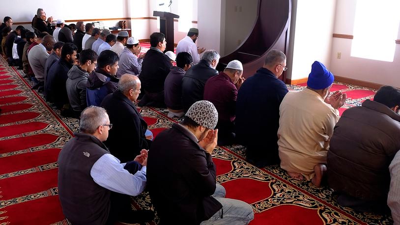 Members of Masjid Al-Madina in Springfield hold Friday prayers. The mosque is investing an additional $500,000 the center and continues to encourage people to attend Friday prayer. Bill Lackey/Staff