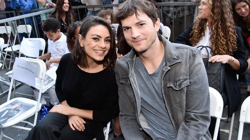 FILE PHOTO: Actors Mila Kunis (L) and Ashton Kutcher at the Zoe Saldana Walk Of Fame Star Ceremony on May 3, 2018 in Hollywood, California.  (Photo by Alberto E. Rodriguez/Getty Images for Disney)