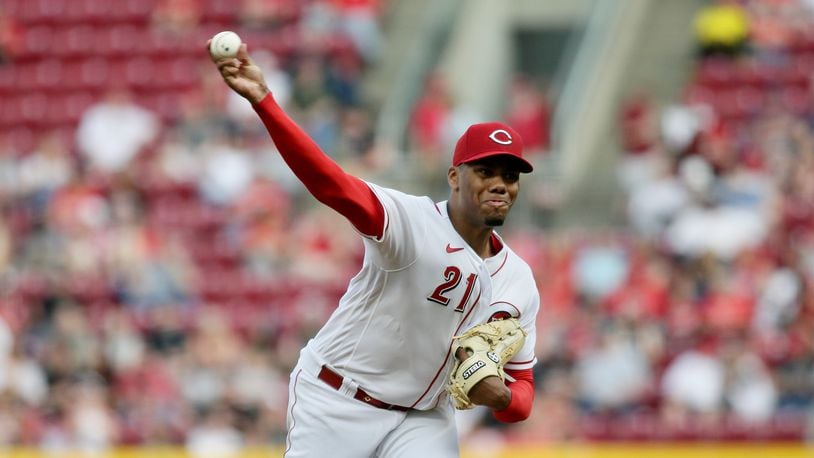 Reds starter Hunter Greene pitches against the Cardinals on Friday, April 22, 2022, at Great American Ball Park in Cincinnati. David Jablonski/Staff