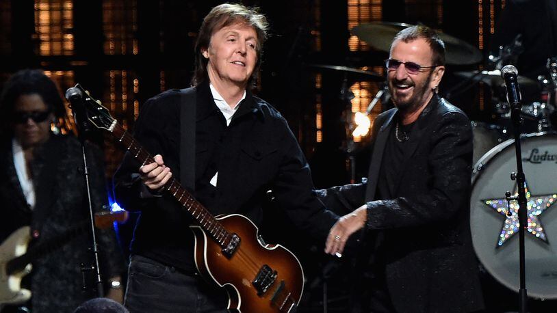 Sir Paul McCartney (L) and inductee Ringo Starr perform onstage during the 30th Annual Rock And Roll Hall Of Fame Induction Ceremony at Public Hall on April 18, 2015 in Cleveland, Ohio. (Photo by Mike Coppola/Getty Images)