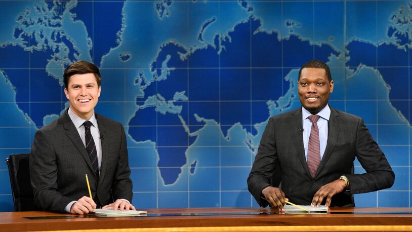 In this March 4, 2017 photo provided by NBC, Colin Jost and Michael Che, right, appear during Weekend Update segment of "Saturday Night Live" in New York. "Saturday Night Live" will broadcast live simultaneously across the U.S. for its final four shows of the season, NBC announced Thursday, March 16. (Will Heath/NBC via AP)
