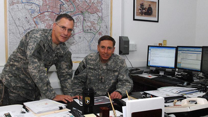 Retired U.S. Army Col. Peter Monsoor, left, who will present a program at the Springfield Civil War Symposium, was executive officer to Gen. David Petraes, right, during the 2007-08 surge of U.S. troops in Iraq. Monsoor will analyze cavalry action at the Battle of Gettysburg. CONTRIBUTED