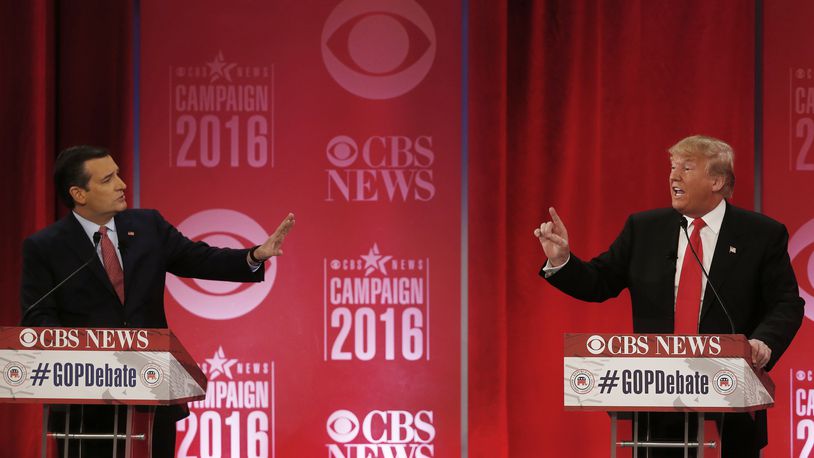 GOP DEBATE--Republican presidential candidate, businessman Donald Trump, right, and Republican presidential candidate, Sen. Ted Cruz, R-Texas, speak at the same time during the CBS News Republican presidential debate at the Peace Center, Saturday, Feb. 13, 2016, in Greenville, S.C. (AP Photo/John Bazemore)