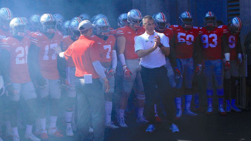 Ohio State’s Urban Meyer waits to lead the team onto the field before a game against UNLV on Saturday, Sept. 23, 2017, at Ohio Stadium in Columbus. David Jablonski/Staff