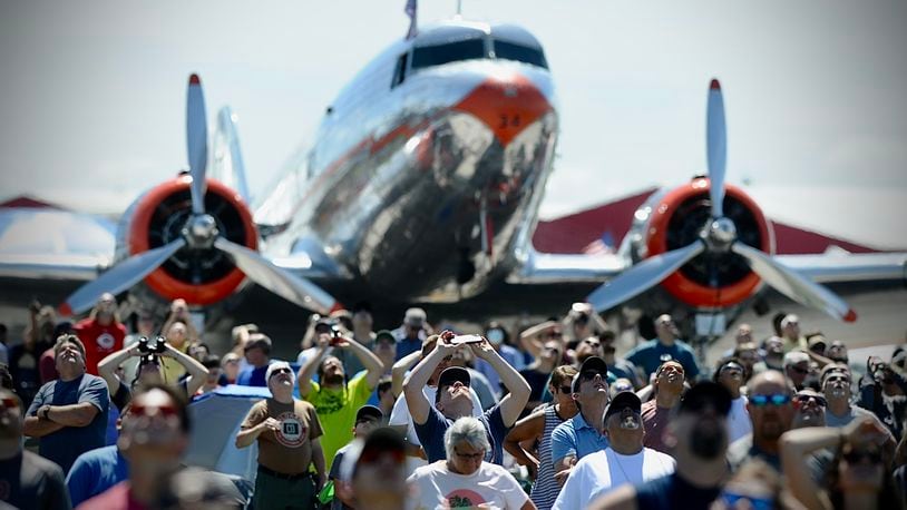 Spectators look to the skies at the Dayton Air Show. PHOTO BY MARSHALL GORBY