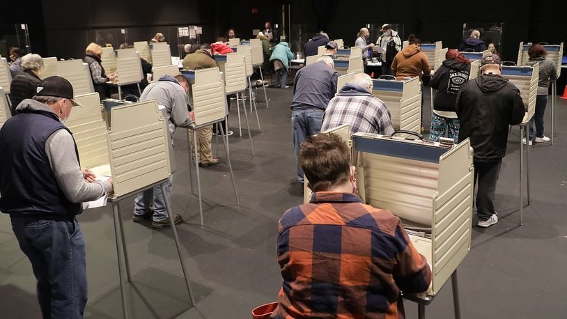 Most of the voting booths were full Wednesday, Oct. 28, 2020 at the early voting site in the Clark State Performing Arts Center. BILL LACKEY/STAFF