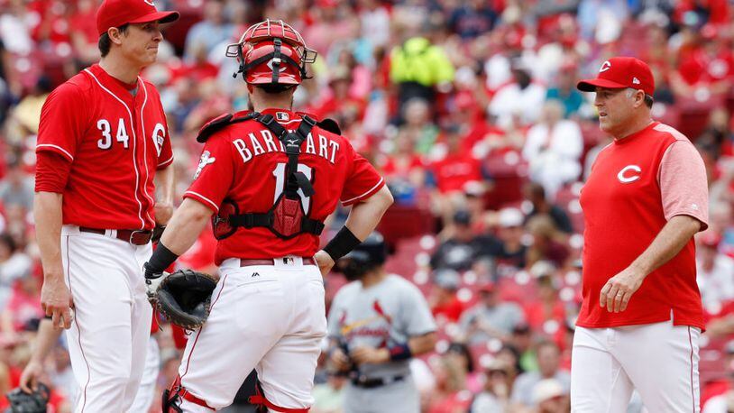 CINCINNATI, OH - AUGUST 06: Homer Bailey #34 of the Cincinnati Reds reacts as he is taken out of the game by manager Bryan Price in the fourth inning against the St. Louis Cardinals at Great American Ball Park on August 6, 2017 in Cincinnati, Ohio. (Photo by Joe Robbins/Getty Images)