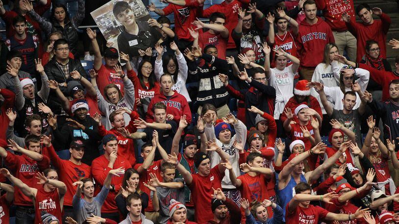 Dayton fans cheer during a game against East Tennessee State on Saturday, Dec. 10, 2016, at UD Arena. David Jablonski/Staff