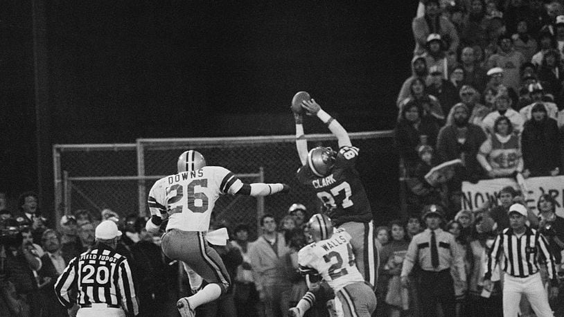 San Francisco 49ers Dwight Clark (87) makes "The Catch" against the Dallas Cowboys on Jan. 10, 1982. The touchdown reception and ensuing extra point sent the 49ers to their first Super Bowl.