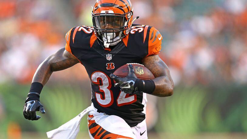 CINCINNATI, OH - AUGUST 28:  Jeremy Hill #32 of the Cincinnati Bengals runs with the ball during the second quarter against the Indianapolis Colts at Paul Brown Stadium on August 28, 2014 in Cincinnati, Ohio. (Photo by Andy Lyons/Getty Images)