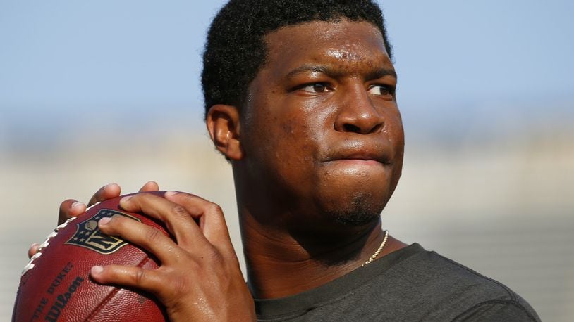 FILE - In this Aug. 15, 2015, file photo, Tampa Bay Buccaneers quarterback Jameis Winston warms up before a preseason NFL football game against the Minnesota Vikings at TCF Bank Stadium in Minneapolis. Winston, who was accused of raping another student when he was in college, says he made a “poor word choice” in comments about women in a recent talk to students at a Florida elementary school. The Tampa Bay Times reports Winston spoke to third- through fifth-grade students at Melrose Elementary in St. Petersburg on Wednesday, Feb. 22, 2017, telling them about his three rules of life. When the kids got fidgety, Winston told the boys to stand up, reminding them that they’re “strong.” Then, he said the “ladies” are “supposed to be silent, polite, gentle.”(AP Photo/Paul Sancya, File)