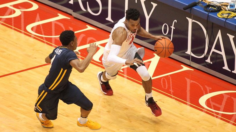 Dayton’s Charles Cooke dribbles up the floor against East Tennessee State on Saturday, Dec. 10, 2016, at UD Arena. David Jablonski/Staff