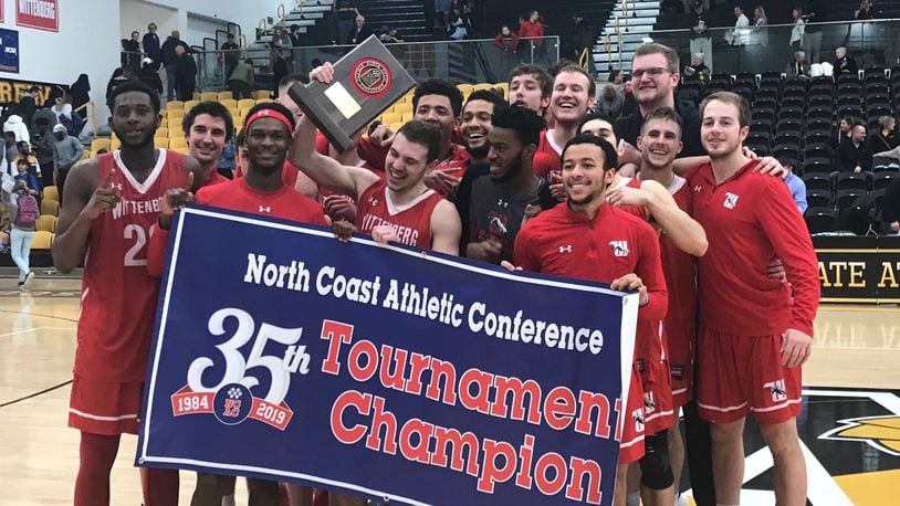 Wittenberg poses for a team photo after winning the NCAC championship by beating Wooster on Saturday, Feb. 23, 2019, at Wooster's Timken Gymnasium.