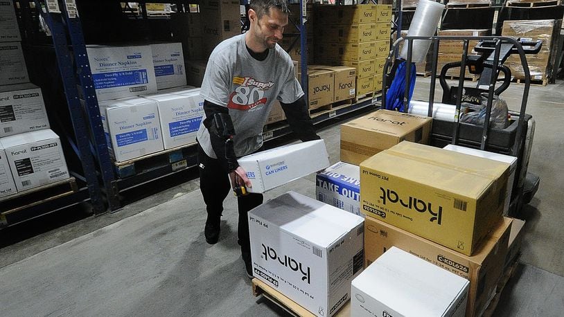 I Supply Company employee Joseph Wood loads a skid with supplies Thursday, Feb. 15, 2024. I Supply Company a regional provider of disposable packaging, janitorial/sanitation supplies, and customized foodservice distribution is marking its 80th year in operation. MARSHALL GORBY\STAFF
