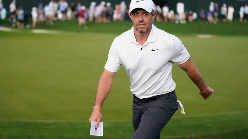 Rory McIlroy, of Northern Ireland, walks off after completing the first round of the Wells Fargo Championship golf tournament at Quail Hollow on Thursday, May 9, 2024, in Charlotte, N.C. (AP Photo/Erik Verduzco)
